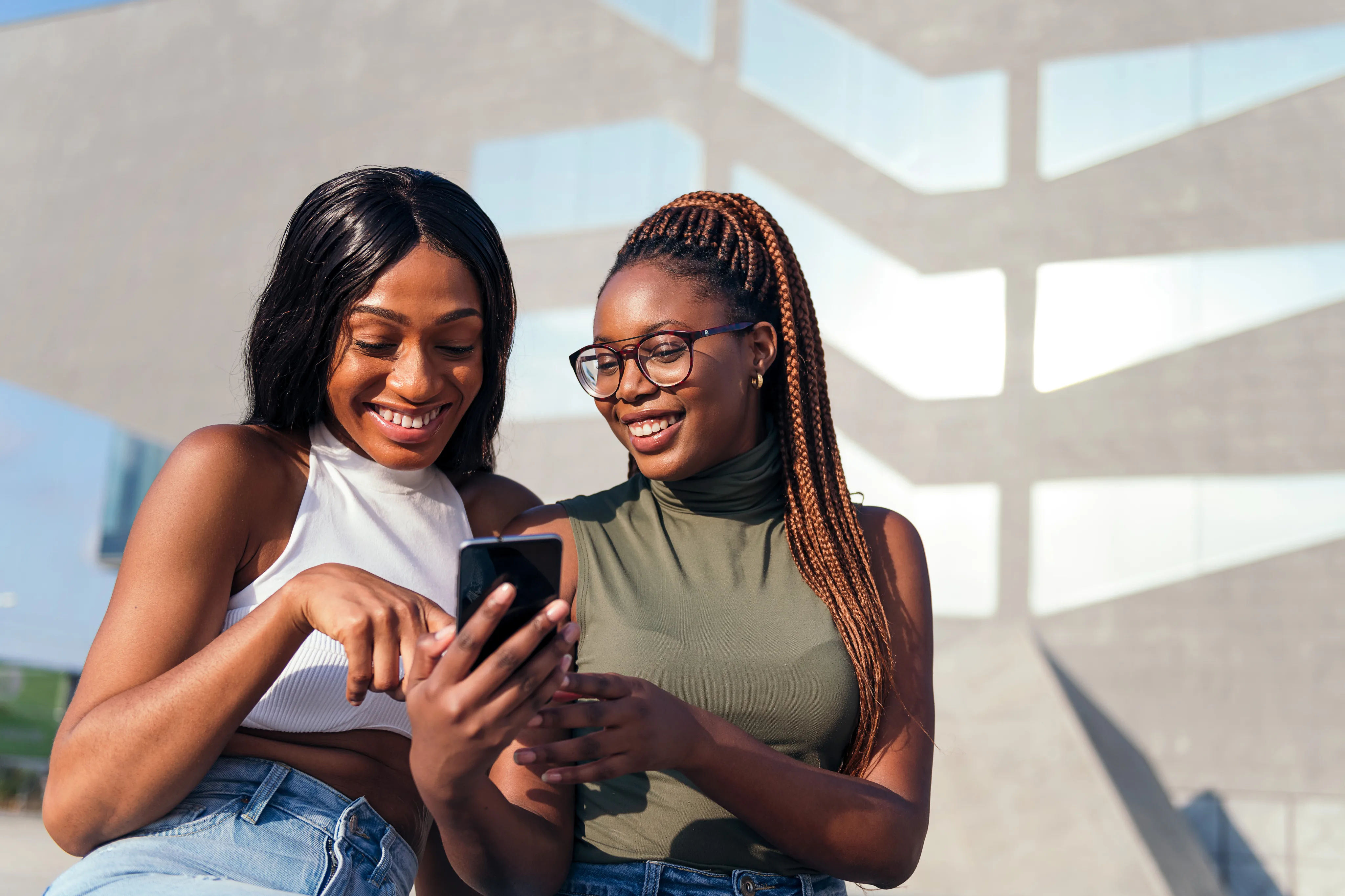 Two friends reviewing a transfer together