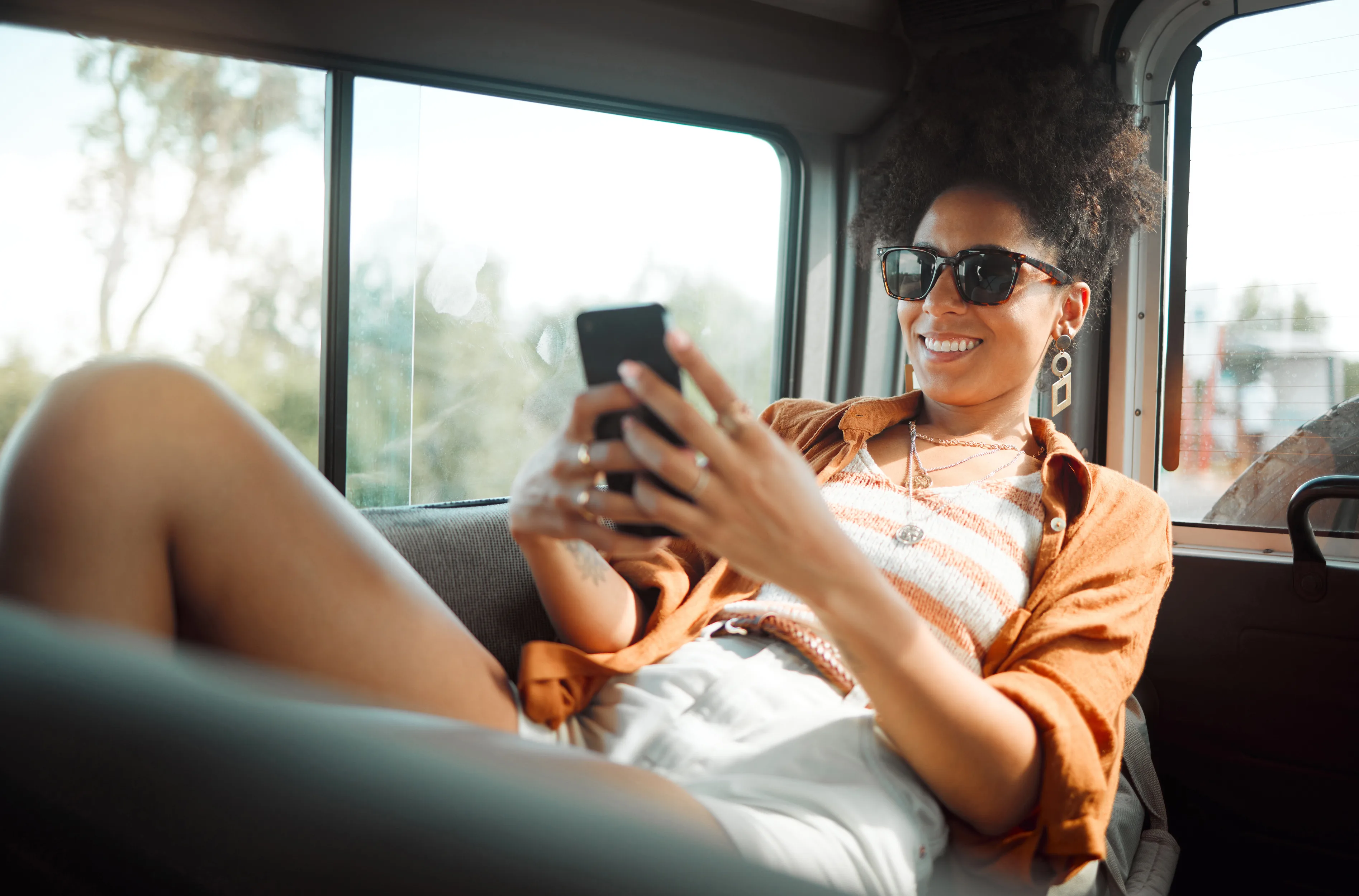 Traveller holding a passport and phone